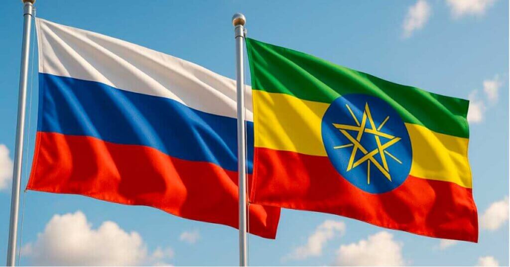 Drapeaux de la Russie et de l’Éthiopie flottant côte à côte sous un ciel bleu, symbolisant le partenariat stratégique russo-éthiopien et la nouvelle multipolarité mondiale.